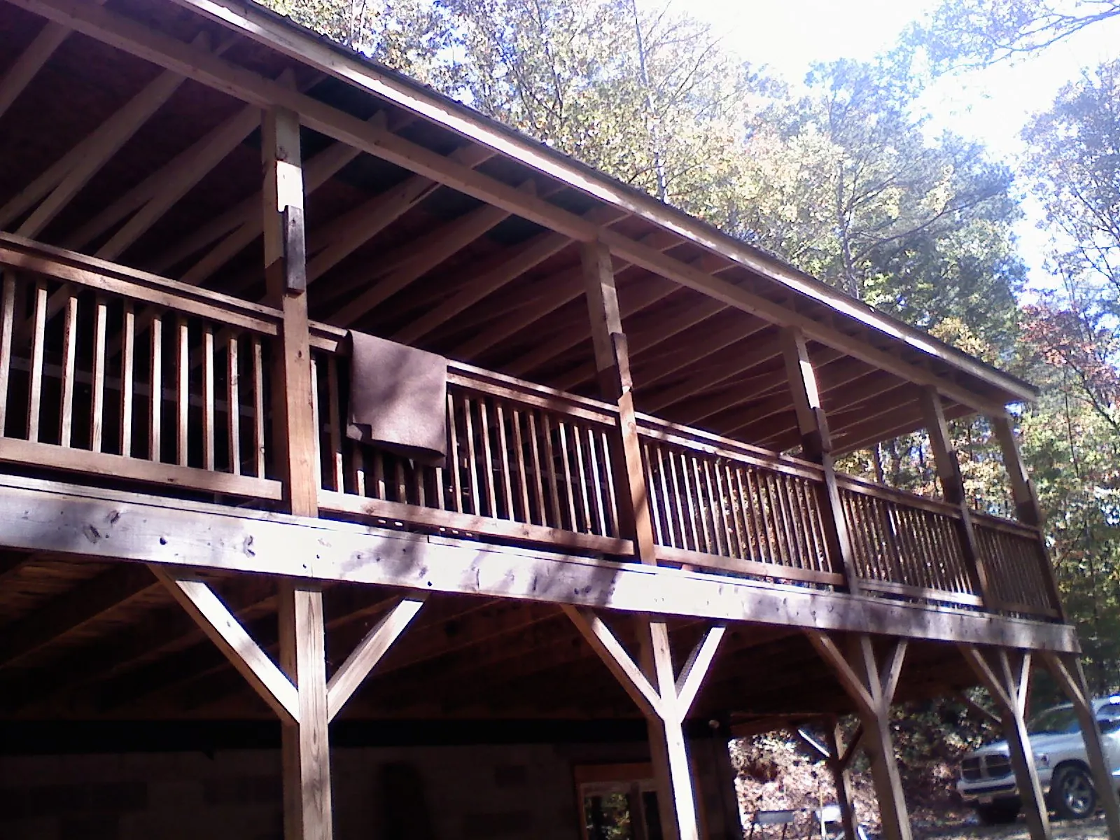 Timber framing under a new elevated porch and deck — Roof Leak Repair in Carr by Roofing Brothers